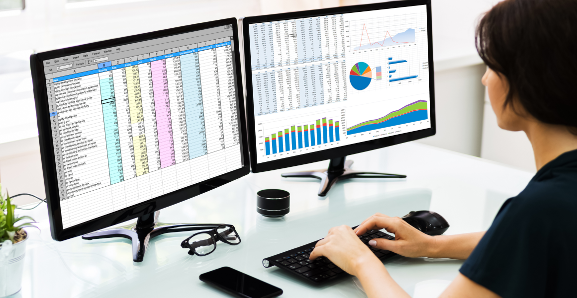 Logistics manager replacing Excel spreadsheets with a digital warehouse management dashboard.