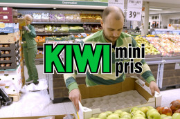 KIWI store employee replenishing fresh produce using goods delivered on SpaceInvader racks, improving ergonomics and in-store efficiency.